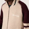 Chaqueta bomber unisex en tejido de punto jacquard blanco y burdeos