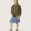 Minifalda plisada para niñas «Journey» en chambray de algodón azul claro con logotipo bordado