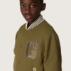 Chaqueta bomber unisex Journey en sarga de nailon verde militar con parche bordado