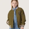 Chaqueta bomber unisex Journey en sarga de nailon verde militar con parche bordado