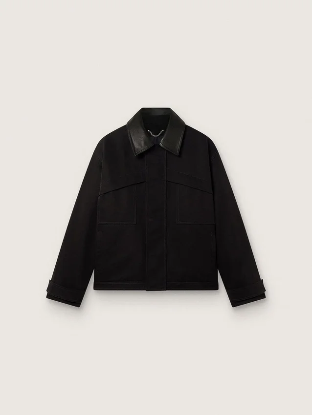 Chaqueta corta acolchada para hombre en algodón negro con cuello de cuero