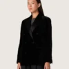 Chaqueta de doble botonadura para mujer en terciopelo negro con solapas de satén negro