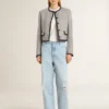 Chaqueta de mujer de lana y seda gris con ribetes de gamuza negra