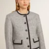 Chaqueta de mujer de lana y seda gris con ribetes de gamuza negra
