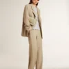Chaqueta de mujer de un solo pecho con rayas finas de color beige y corte oversize