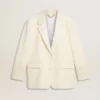 Chaqueta oversize de un solo pecho en blanco con efecto de seda y bordados