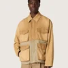 Chaqueta safari unisex de algodón en beige y verde militar con bolsillos extragrandes