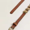 Cinturón Trinidad de cuero envejecido color beige con tachuelas maxi doradas