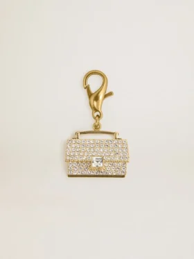 Colgante con forma de bolso de latón dorado con cristales
