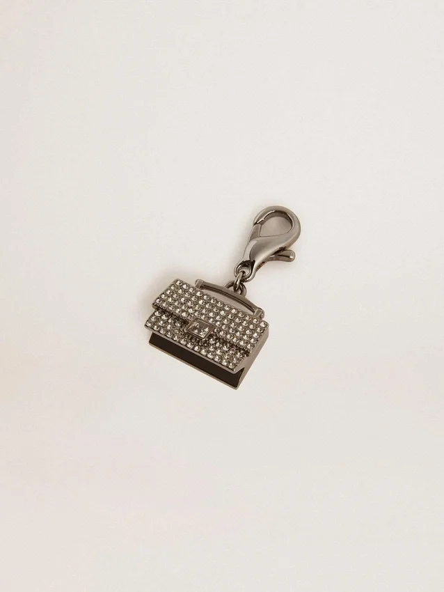 Colgante con forma de bolso de latón plateado con cristales