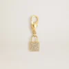 Colgante con forma de candado en latón dorado con cristales