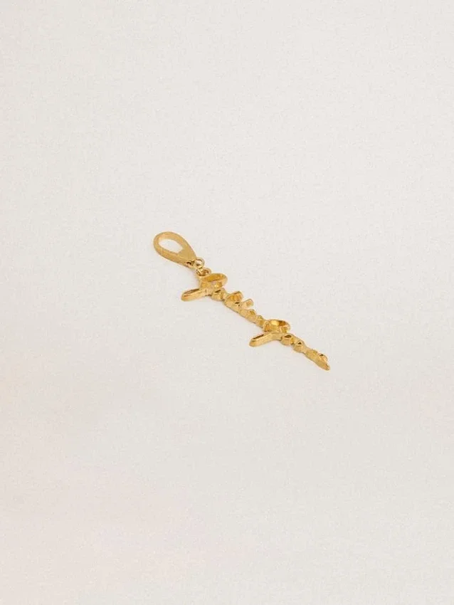 Colgante de latón dorado con la firma de golden goose