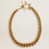 Collar de cadena decreciente en oro antiguo con cierre en forma de estrella