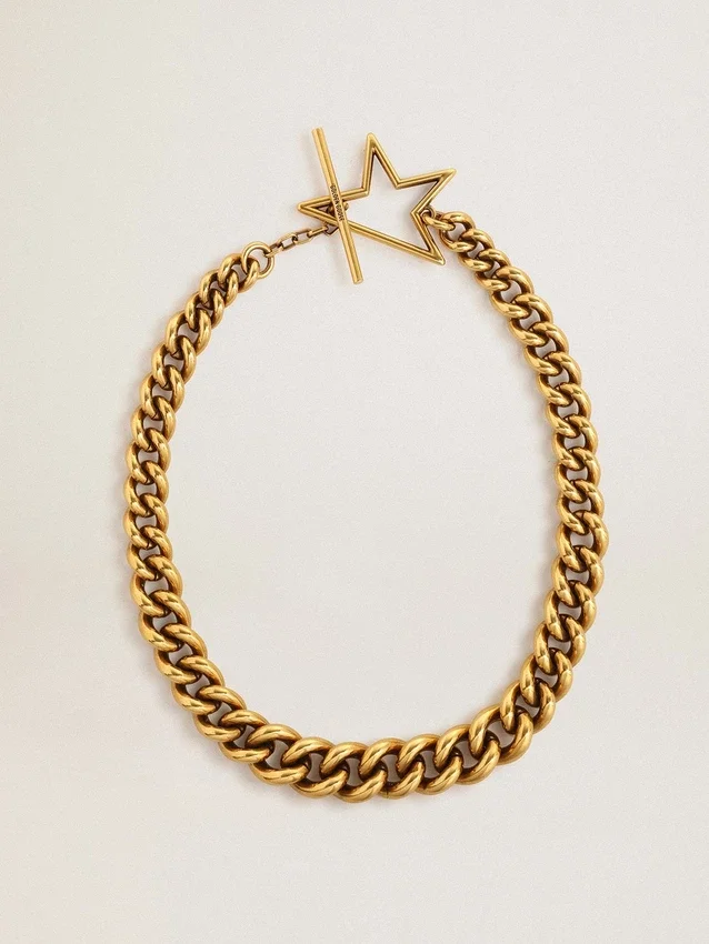 Collar de cadena decreciente en oro antiguo con cierre en forma de estrella