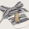 Cordones a rayas «Pieles» con diamante de pluma dorado