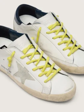 Cordones amarillos para tenis con detalles en gris