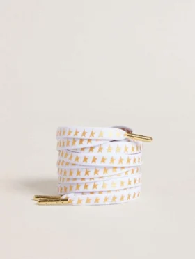 Cordones de algodón blanco con estrellas doradas en contraste