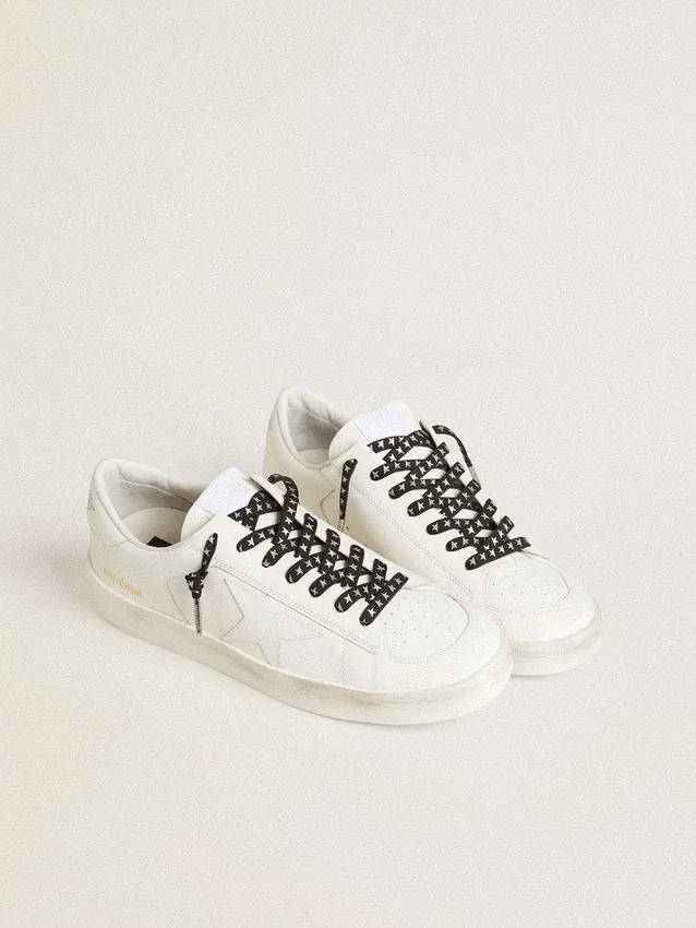 Cordones de algodón negro con estrellas plateadas en contraste