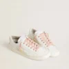 Cordones de algodón rosa con estrellas doradas en contraste