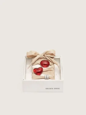 Cordones dorados de las Pieles CNY con dijes rojos y cristales