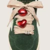 Cordones dorados de las Pieles CNY con dijes rojos y cristales