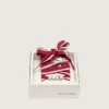 Cordones «Pieles» a rayas rojas y blancas con dijes
