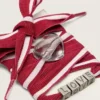 Cordones «Pieles» a rayas rojas y blancas con dijes