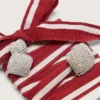 Cordones «Pieles» bicolor con tres dijes plateados