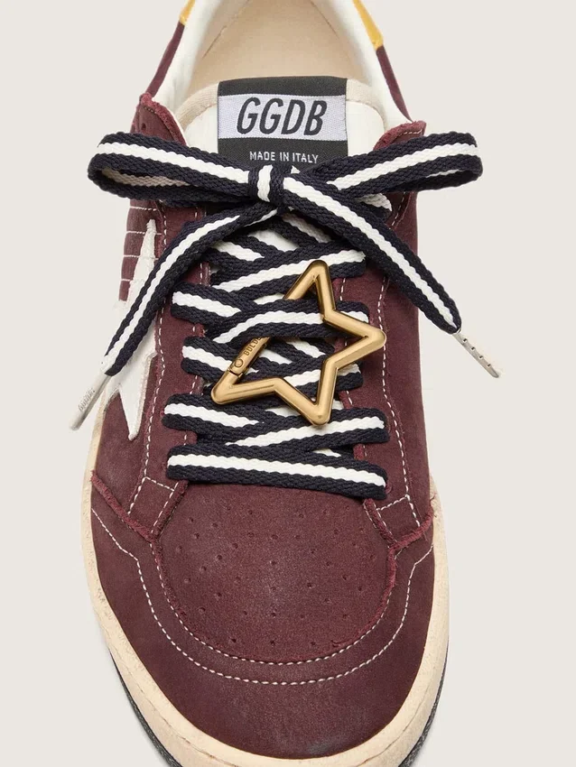 Cordones «Pieles» en blanco y negro con mosquetón en forma de estrella