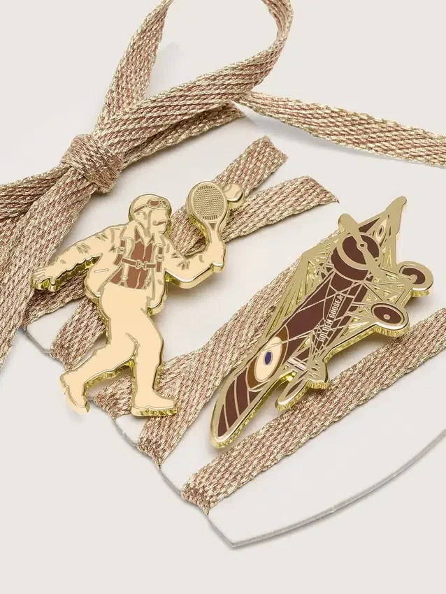 Cordones «Pieles» en rojo arcilla metalizado con dos pasadores