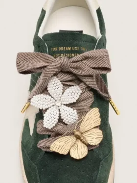 Cordones «Sparkling» de Pieles en marrón, negro y plateado con diseño en espiga y dos dijes aplicados