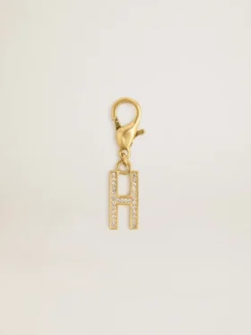 Dije con la letra H en latón dorado con cristales