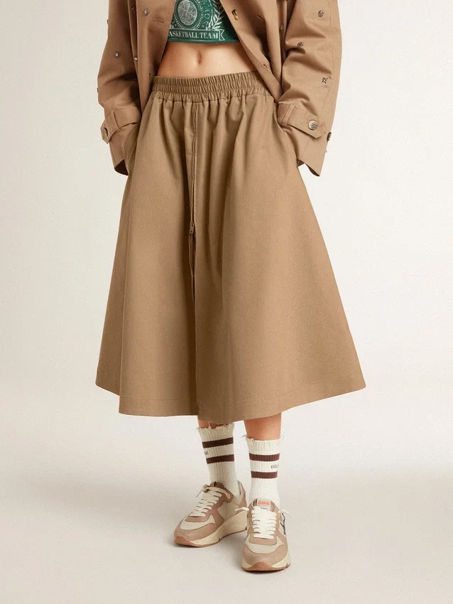 Falda circular beige para mujer