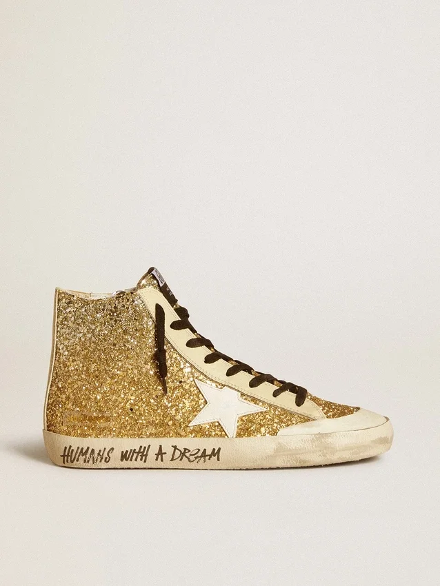 Francy Penstar en brillo dorado con estrella de cuero blanco
