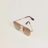 Gafas de sol estilo aviador con marco dorado y lentes beige