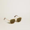 Gafas de sol estilo aviador con marco dorado y lentes verdes