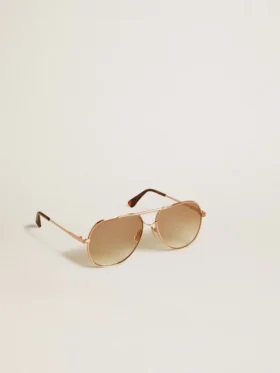 Gafas de sol estilo aviador con marco en oro rosa y lentes color miel