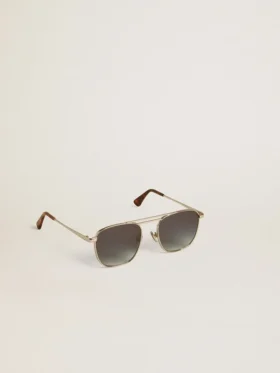 Gafas de sol estilo aviador con marco plateado y lentes azules