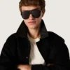 Gafas de sol estilo aviador con montura y lentes negras