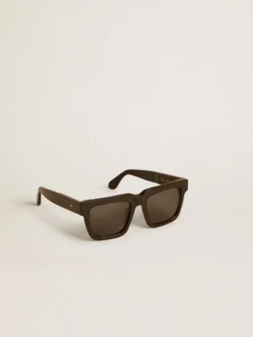 Gafas de sol Jamie de estilo cuadrado con marco negro y logotipo dorado