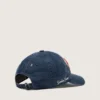 Gorra de béisbol azul denim con parche «Golden» de felpa roja y blanca