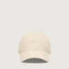 Gorra de béisbol color crudo con estrella bordada tono sobre tono