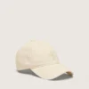 Gorra de béisbol color crudo con estrella bordada tono sobre tono