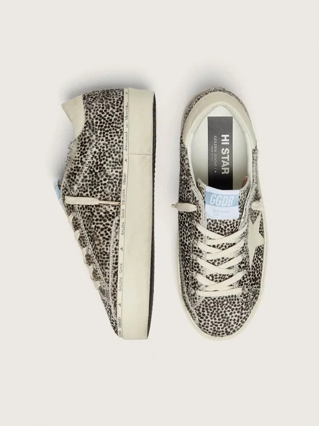 Hi Star para mujer en piel de potro en blanco y negro con estrella de cuero blanco