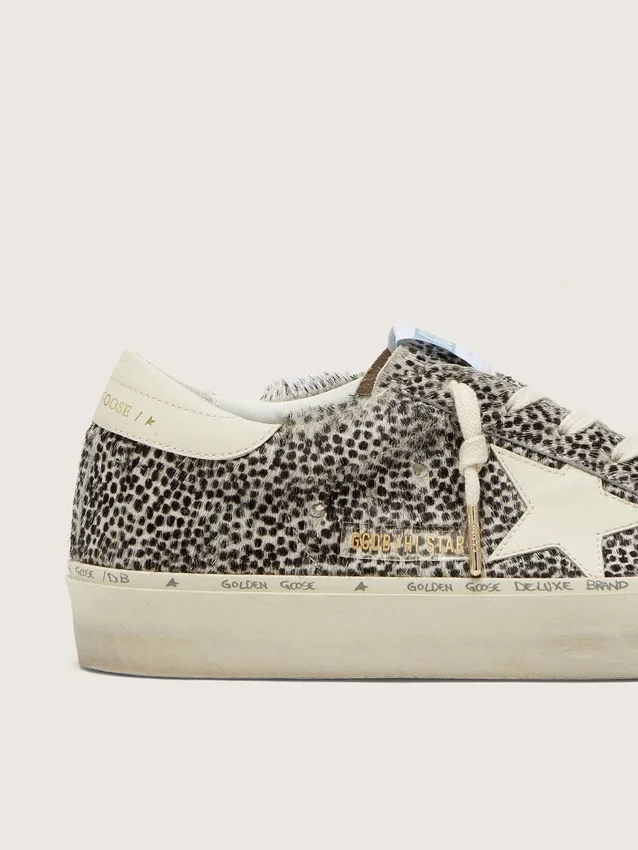Hi Star para mujer en piel de potro en blanco y negro con estrella de cuero blanco