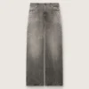 Jeans estilo boyfriend para mujer en denim gris con tachuelas plateadas con efecto degradado