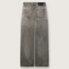 Jeans estilo boyfriend para mujer en denim gris con tachuelas plateadas con efecto degradado