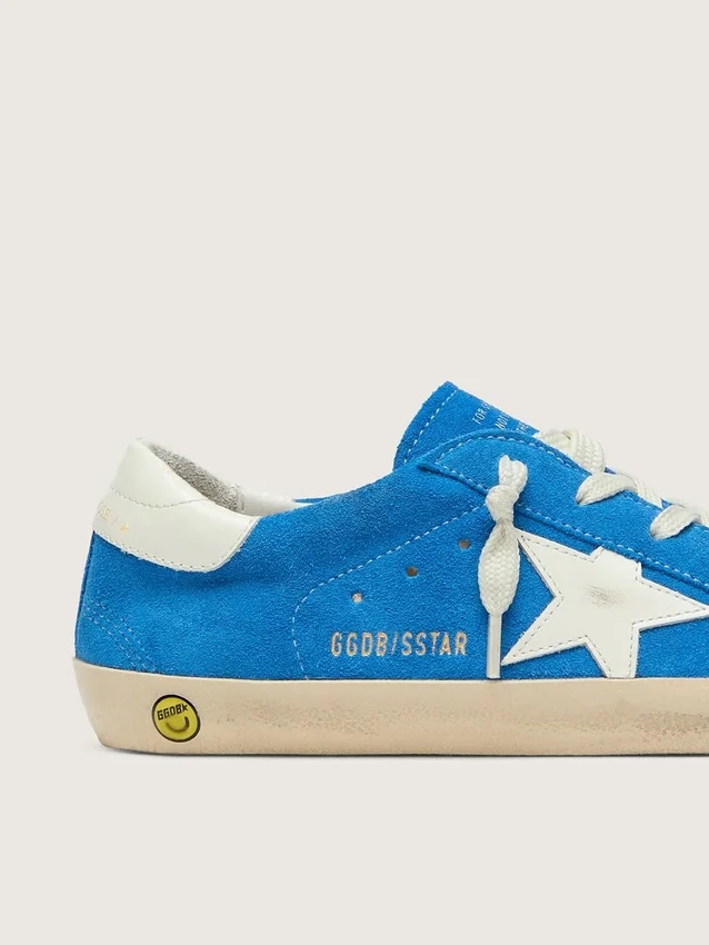 Junior Super-Star en gamuza azul brillante con estrella de cuero blanco