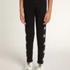 Leggings negros para niñas con estrellas blancas en los costados