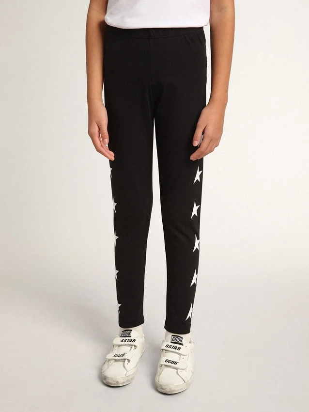 Leggings negros para niñas con estrellas blancas en los costados